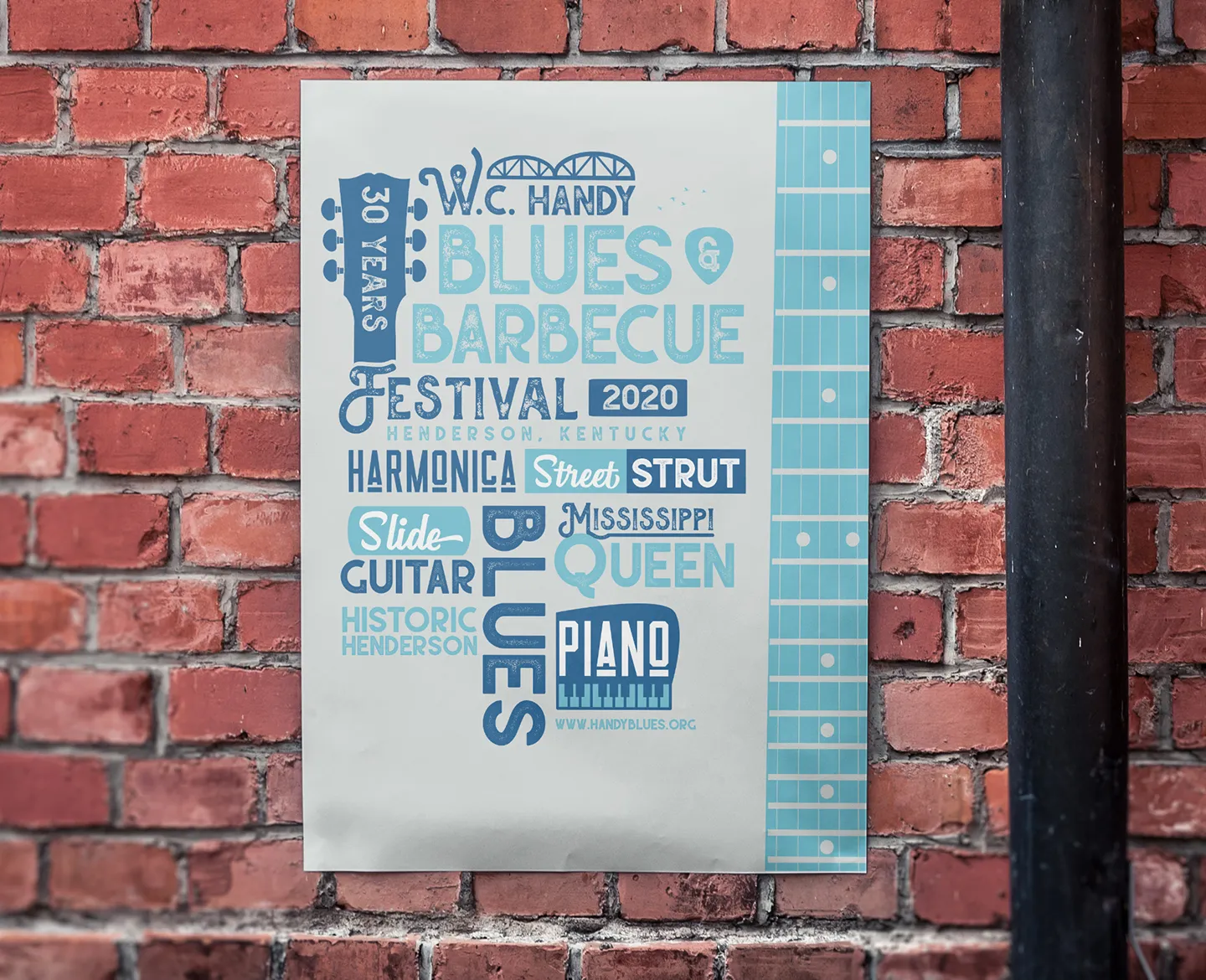WC Handy Blues and Barbecue Festival Poster Design on a brick wall